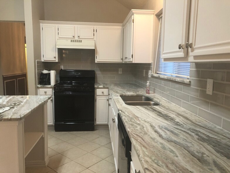 Updated granite countertops - 2202 Bowie Ln