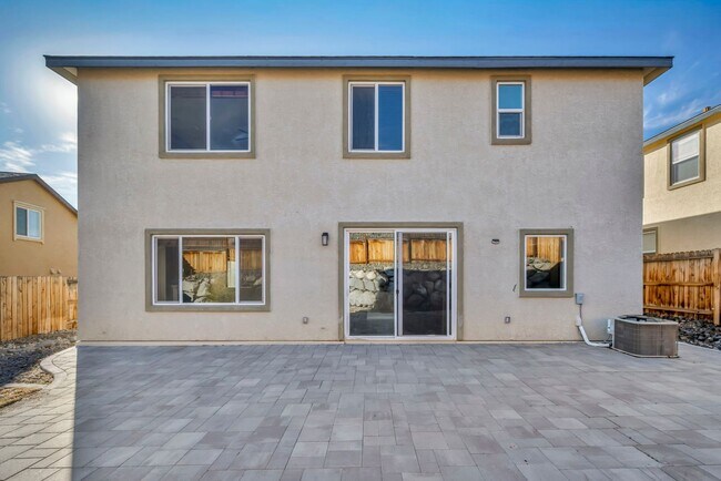 Building Photo - Sun-Filled, Spacious Living with a Three-Car Garage