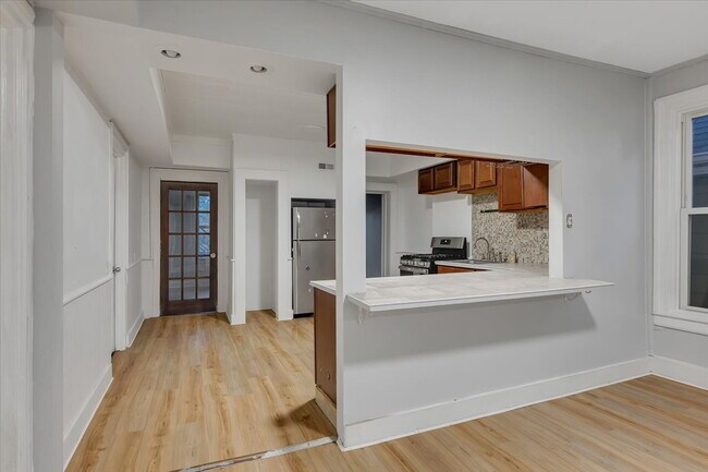 Building Photo - "Spacious 3-Bed Home at 57 1/2 Saratoga Av...