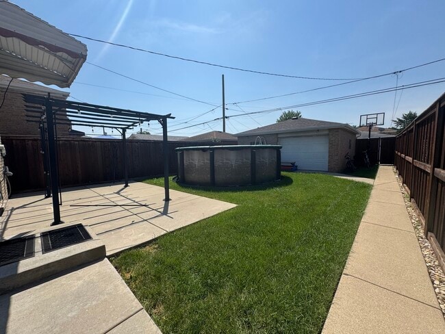 Building Photo - 6525 W 63rd Pl