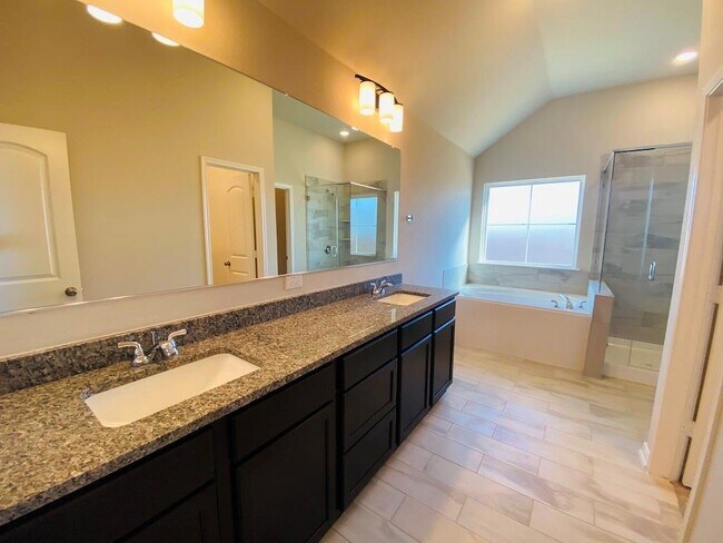 Building Photo - 5205 Leaning Tree