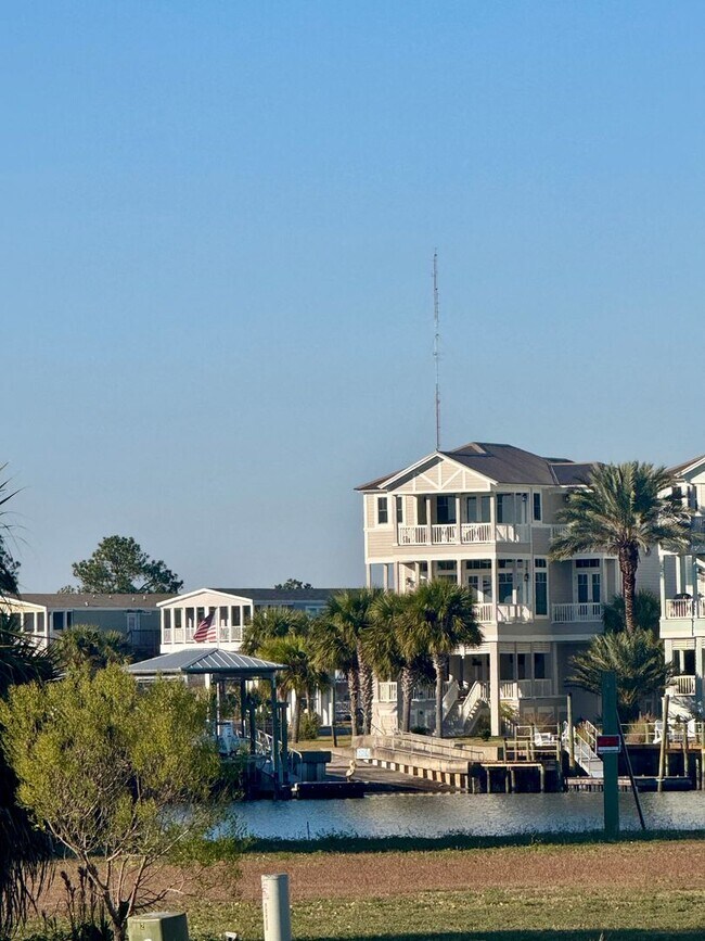Building Photo - Waterfront Shell Point Home with Dock, Hot Tub, Elevator, & Golf Cart