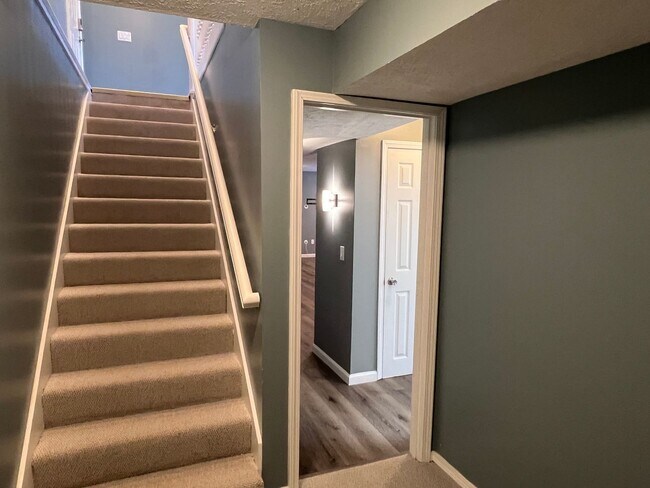 Building Photo - Now Available! Gorgeous Walkout Basement Home with a Pool, Ozark