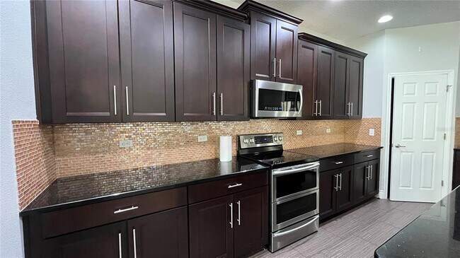 Building Photo - 6031 Roseate Spoonbill Dr