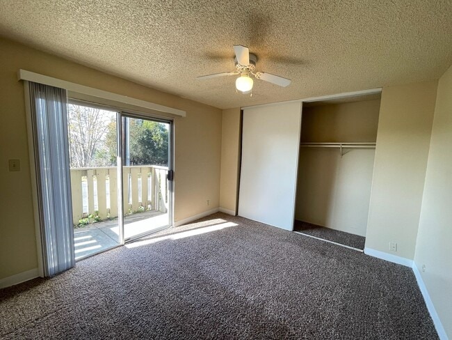 Building Photo - Downstairs 1-Bedroom Apartment, Private Patio, New Carpet & On-Site Laundry