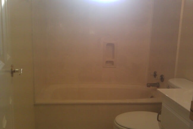 Building Photo - THREE BEDROOMS THREE BATHS, FENCED BACKYARD