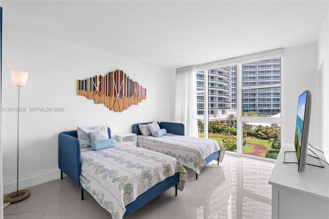 Building Photo - 10275 Collins Ave