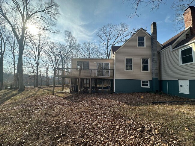 Building Photo - House in Bedford with Lot of Outdoor Space.
