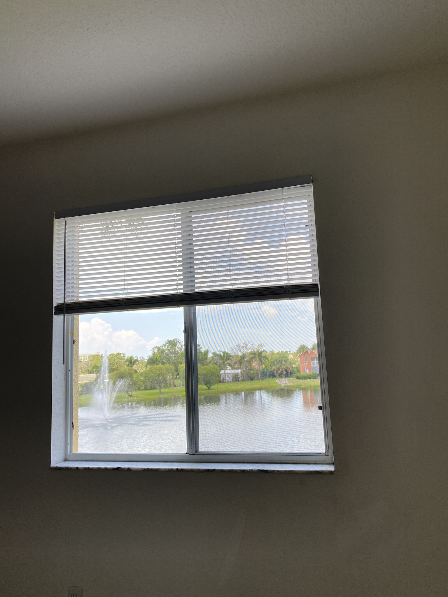 water view from bedroom 1 - 6450 Aragon Way