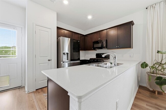 Building Photo - 7602 Poppy Petal Dr