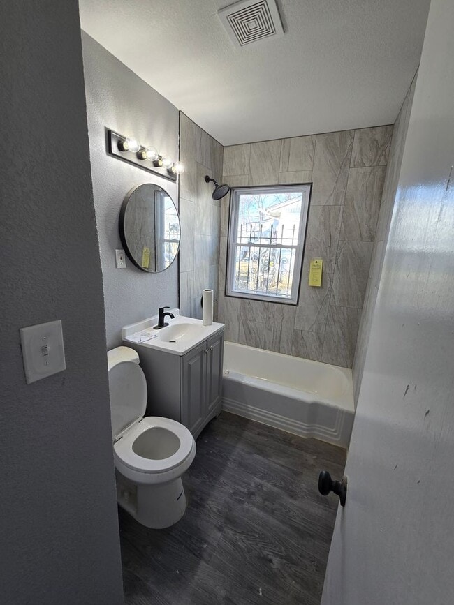 Building Photo - 3 bedroom with bonus extra room in basement fully rehabed