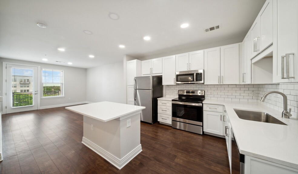 New kitchens with stainless steel appliances and white quartz countertops - 21 Fitzsimons