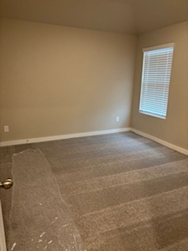 Building Photo - BRAND NEW HOME!  First month free!