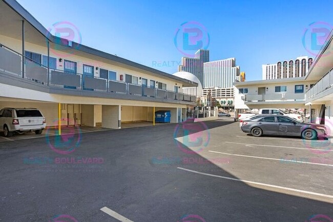 Building Photo - Studio apartment available now in the hear...