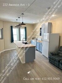 Building Photo - New Modern 1-bed 1-bath right next to majo...