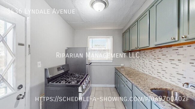 Building Photo - Fully Renovated & Fenced Backyard!