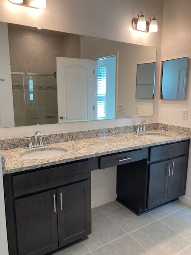 Building Photo - Like New 3 bedroom + den with French doors, screened in porch and Fenced yard and much more...