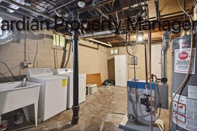 Building Photo - Linden Hills Side By Side, Hardwood Floors, Attached Garage, New Efficient Heating System, Pets W...