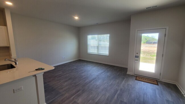 Building Photo - Beautiful New Townhome for Military Tenant