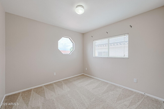 Building Photo - 15569 W Gelding Dr