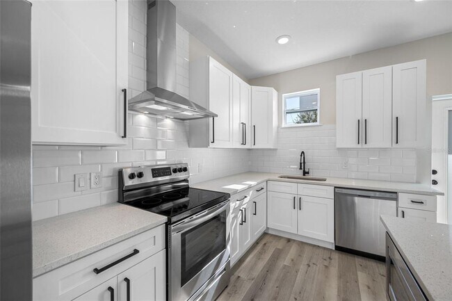 Building Photo - 6910 Dartmouth Ave N