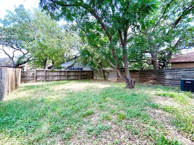 Building Photo - MUST SEE! Spacious Duplex With Garage & Google Fiber Access!