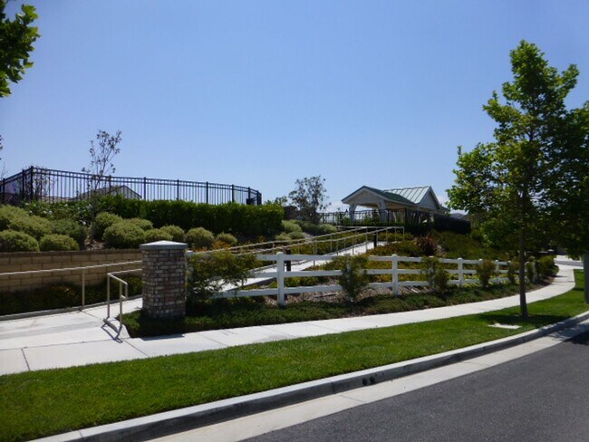 Building Photo - Short Term Lease - Grand 4-Bedroom Home with Entertainer's Yard in Gated River Village!