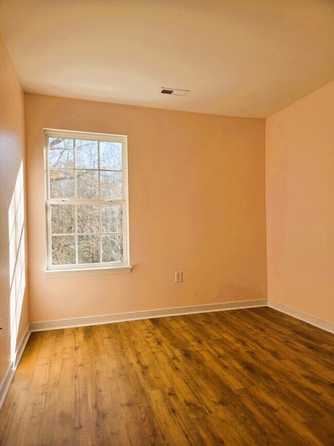 Building Photo - Ashley Village Townhome with all new LPV flooring and paint.