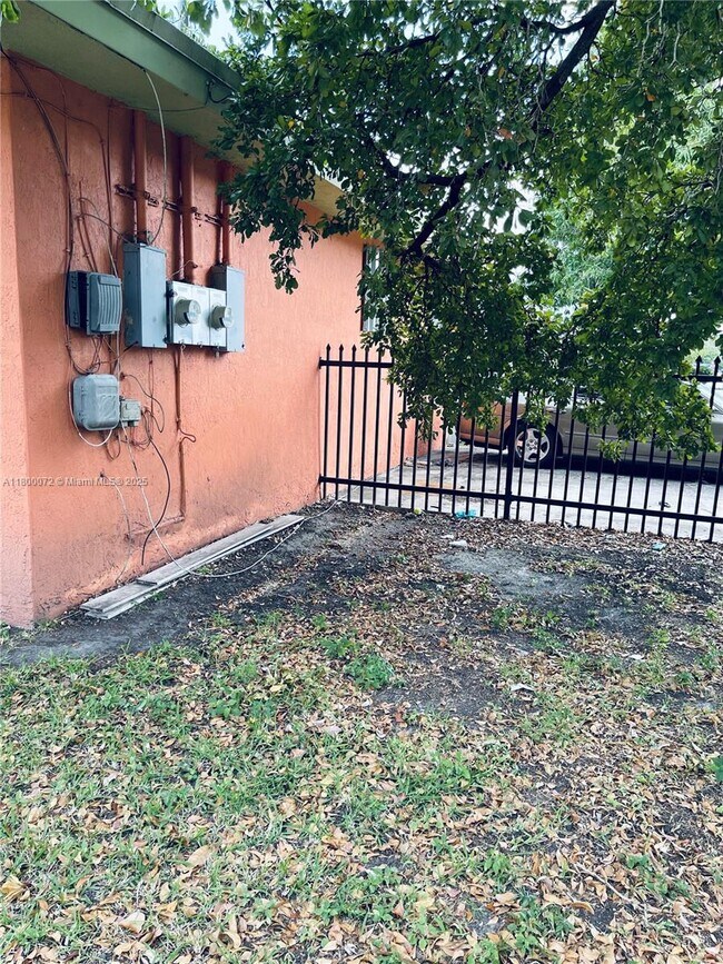 Building Photo - 5857 NW 13th Ave
