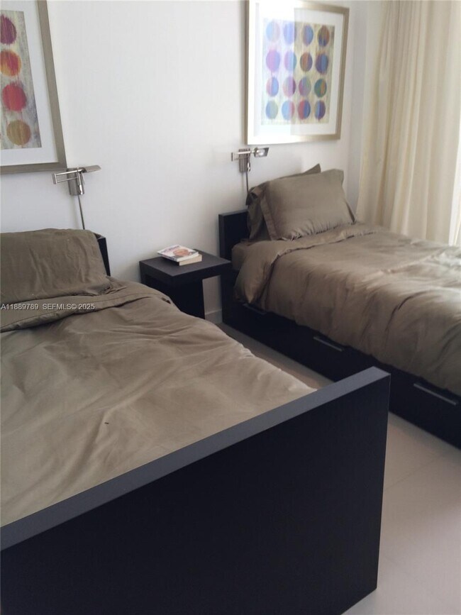 Building Photo - 5555 Collins Ave