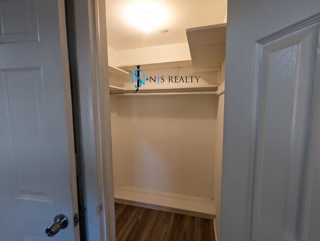 Building Photo - Just Reduced!  2/2/1 with  RENOVATED baths & kitchen, fenced yard, NEW lvp flooring and a OVERSIZ...