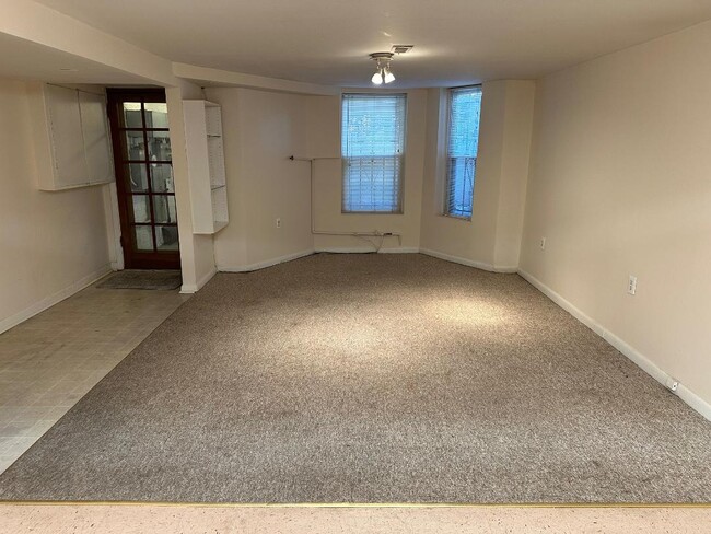 Living/dining area with bath window - 1336 Kenyon St NW