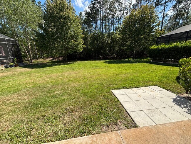 Building Photo - Spacious 4BR/3BA Home with 3-Car Garage, Bonus Office & Covered Patio in St Johns!