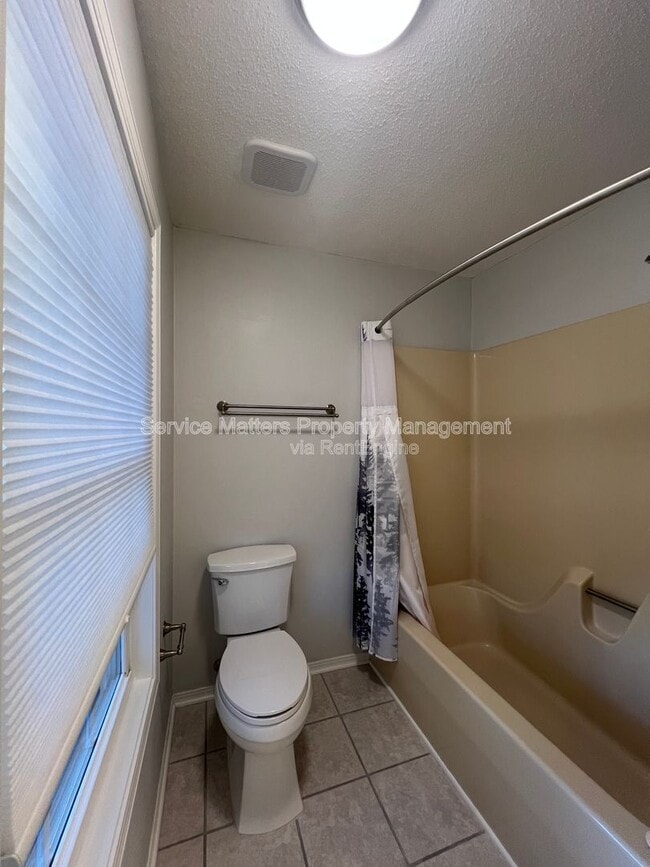 Building Photo - 6004 Players Pl