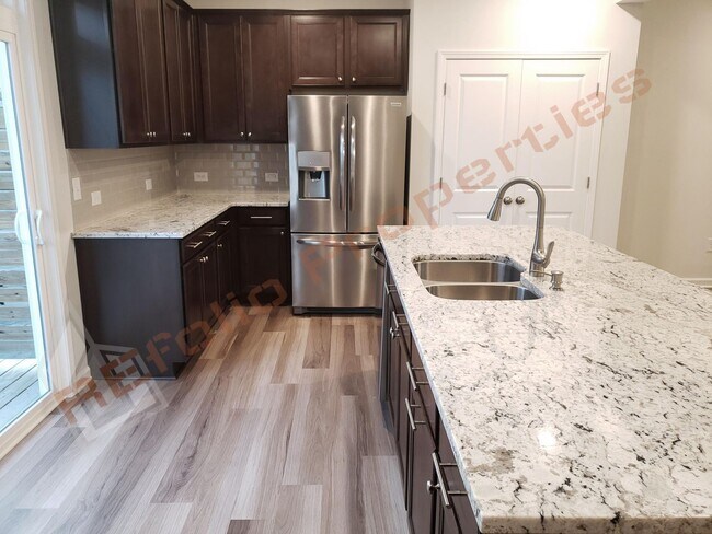 Building Photo - Luxury 3 Story 4 BD/3.5 Bath Townhome @ Sm...