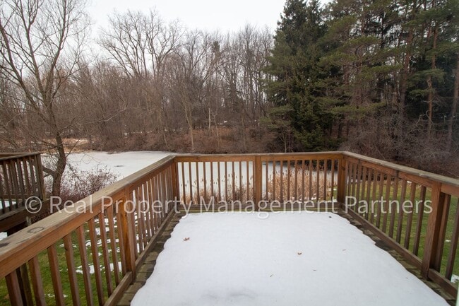 Building Photo - Forest Hills 3 Bed Townhome with Garage, Pond View and Some Utilities Included