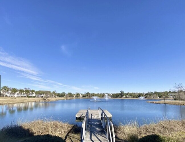 Building Photo - Spacious, Four Bedroom Townhouse With a View!