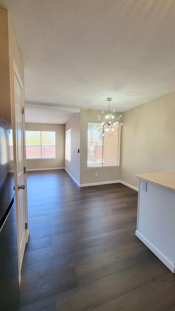 Building Photo - Cozy 1BR/1BA Condo w/ A/C • Full Kitchen Suite • Assigned Parking in Tucson