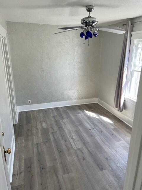 master bedroom with ceiling fan - 22025 Galvez St