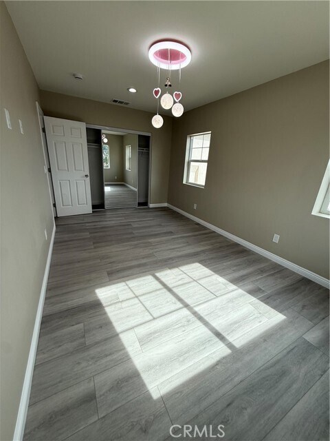 Building Photo - 7398 N Maple Ave