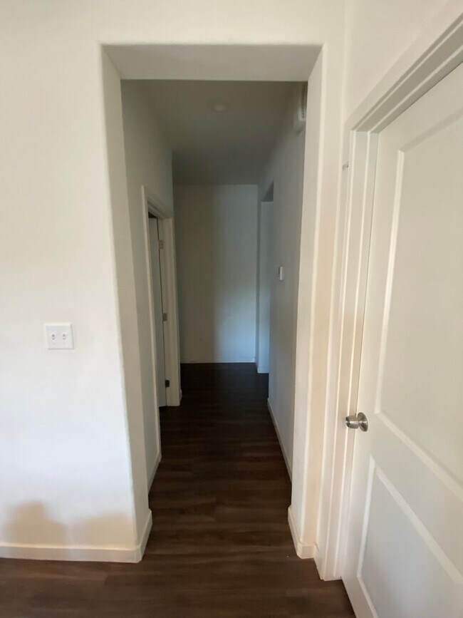 Building Photo - Welcome to the Best Deal in Town. Fully furnished 4 BD 2 BA house on a corner lot