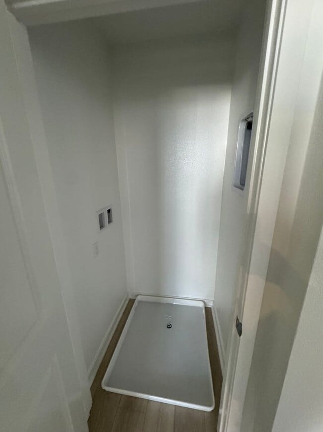 Building Photo - Brand New 1 bedroom, 1 bath Townhome with 2 car tandem garage for lease