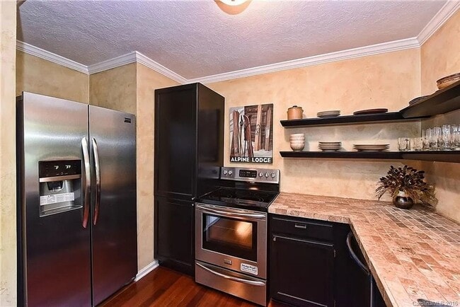 Building Photo - Charming 2BR Condo in Charlotte