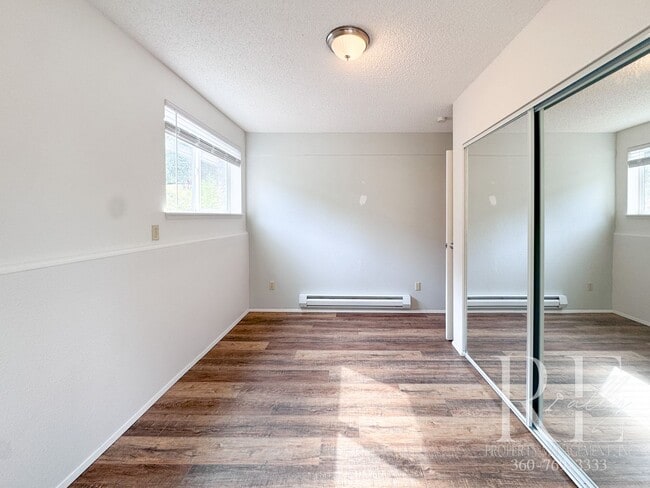 Building Photo - Spacious 4-Bedroom Home with Garage on Qui...