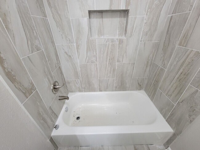 Building Photo - REMODELED/ UPDATED 4 BEDROOM 2 BATH WITH C...