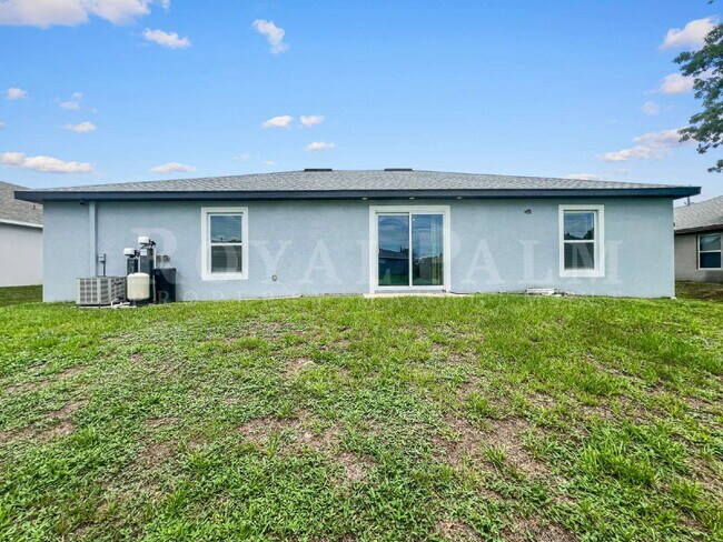Building Photo - 4BR/2BA Home with High Ceilings, Garage & Large Kitchen Island