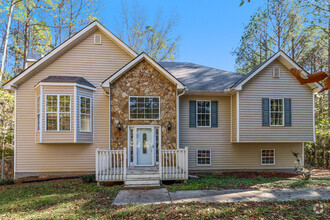 Building Photo - Spacious 4-Bedroom Home with Vaulted Ceilings