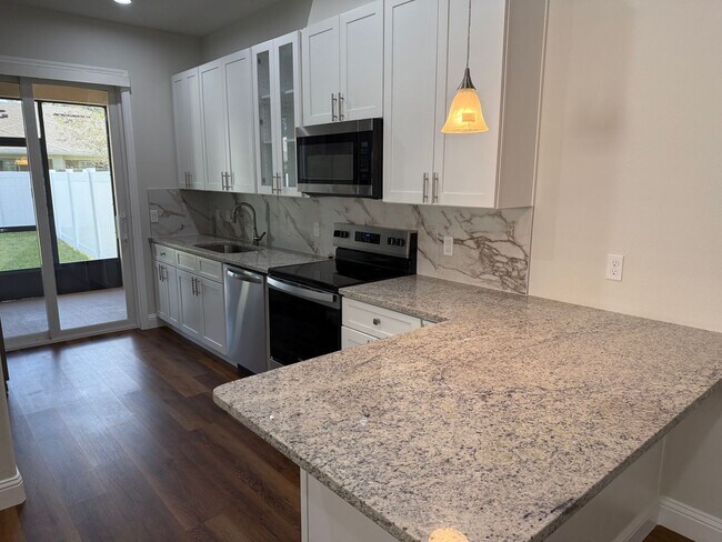 Building Photo - Brand new 3/2/1 with screed in porch and fenced yard! 2 units available