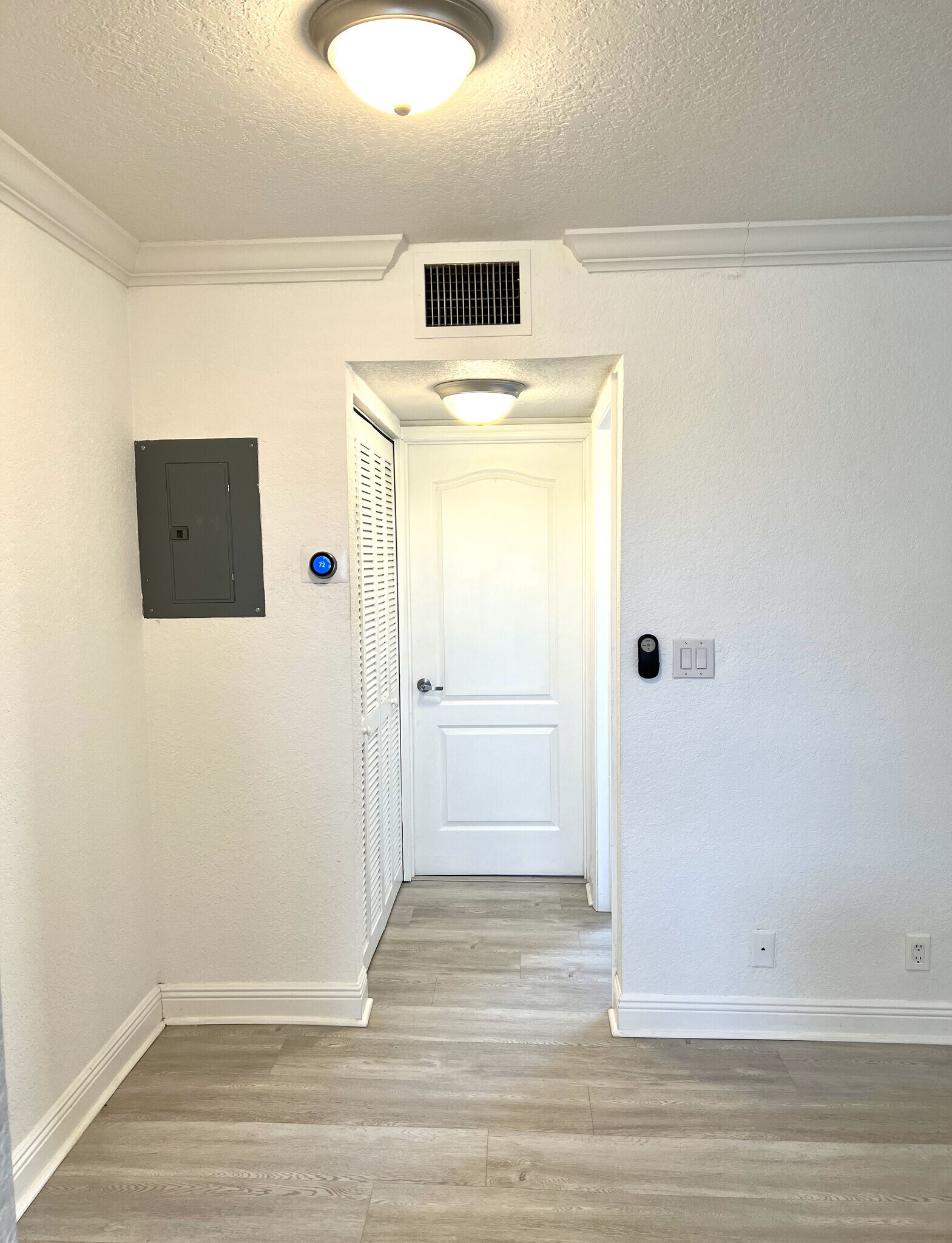 Corridor to Bath & BR - 110 SE 2nd St