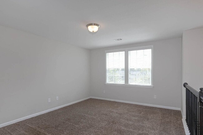 Building Photo - 4BR/3.5BA · 2,809 SF · Owner's Suite on Main · Fenced Yard · Midland, GA — $2,800/mo